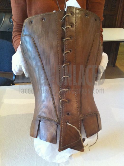 BACK: Leather scored vertically to imitate stitching